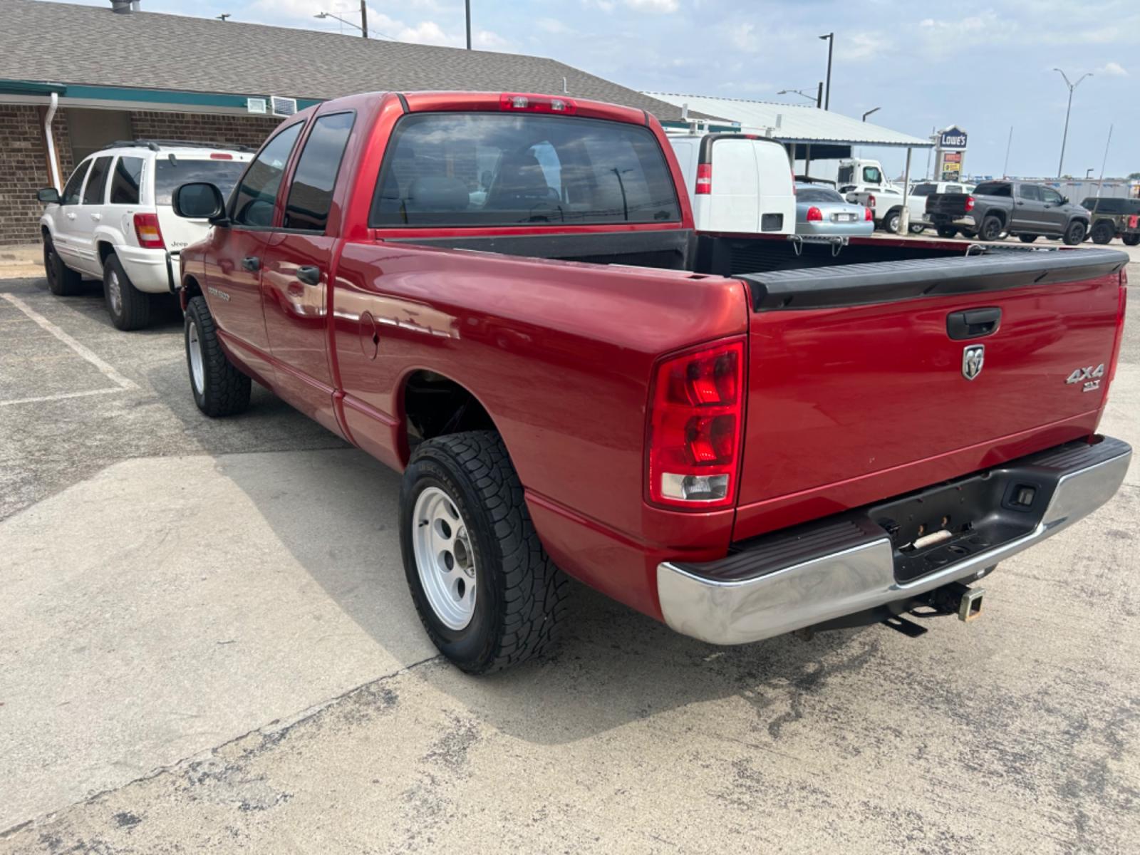 2006 Red /Beige Dodge Ram 1500 (1D7HU18N36S) , located at 1687 Business 35 S, New Braunfels, TX, 78130, (830) 625-7159, 29.655487, -98.051491 - Photo #1